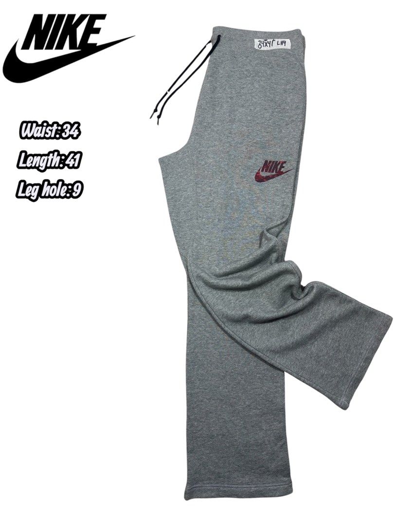 Nike Grey Sweatpants Drawstring Joggers Size 34 (Category: Joggers) located in Cavite. Submitted by sidirvinp76902 (Listing ID 1471207163, Image 1). Description: - Brand: Nike - Color: Grey with black drawstring and red/black patterned swoosh logo - Fit: Comfortable wide leg style - Measurements: 34" waist, 41" length, 9" leg hole - Condition: Excellent / Pre-loved (ready to wear) - Mode of Payment: GCash, BPI, or Bank Transfer - Shipping: Via J&