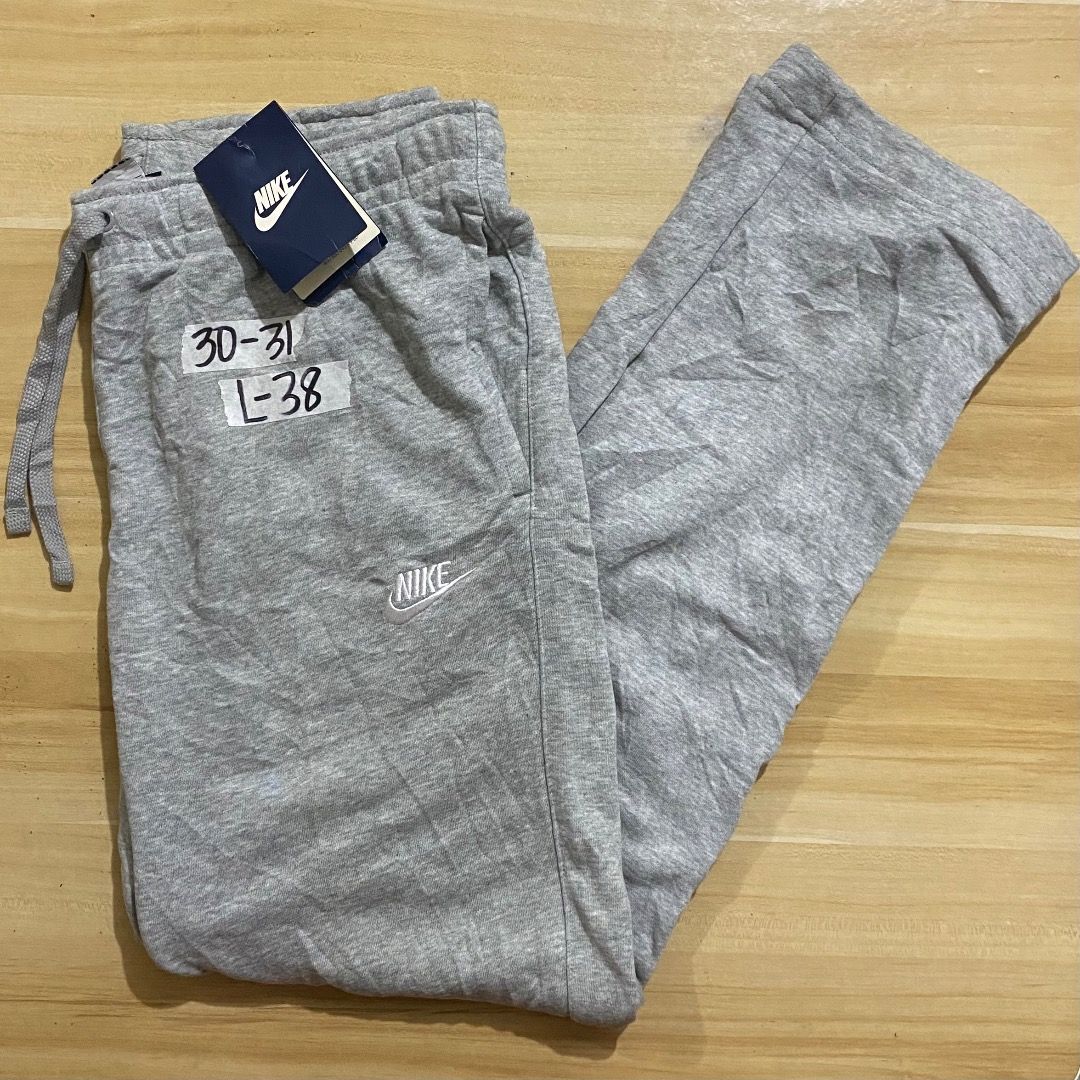 Nike Grey Sweatpants Size M (Category: Joggers) located in Bacolod City. Submitted by jeybe112019 (Listing ID 1471271967, Image 1). Description: - Brand: Nike - Condition: Brand new with tags - Color: Grey - Size: Medium (fits waist 30-31 inches) - Material: Soft and comfortable cotton blend - Design: Embroidered logo on the left leg, adjustable drawstring waistband - Fit: Standard casual fit - Origin: Made in China - Ideal for: Everyday wear, lo