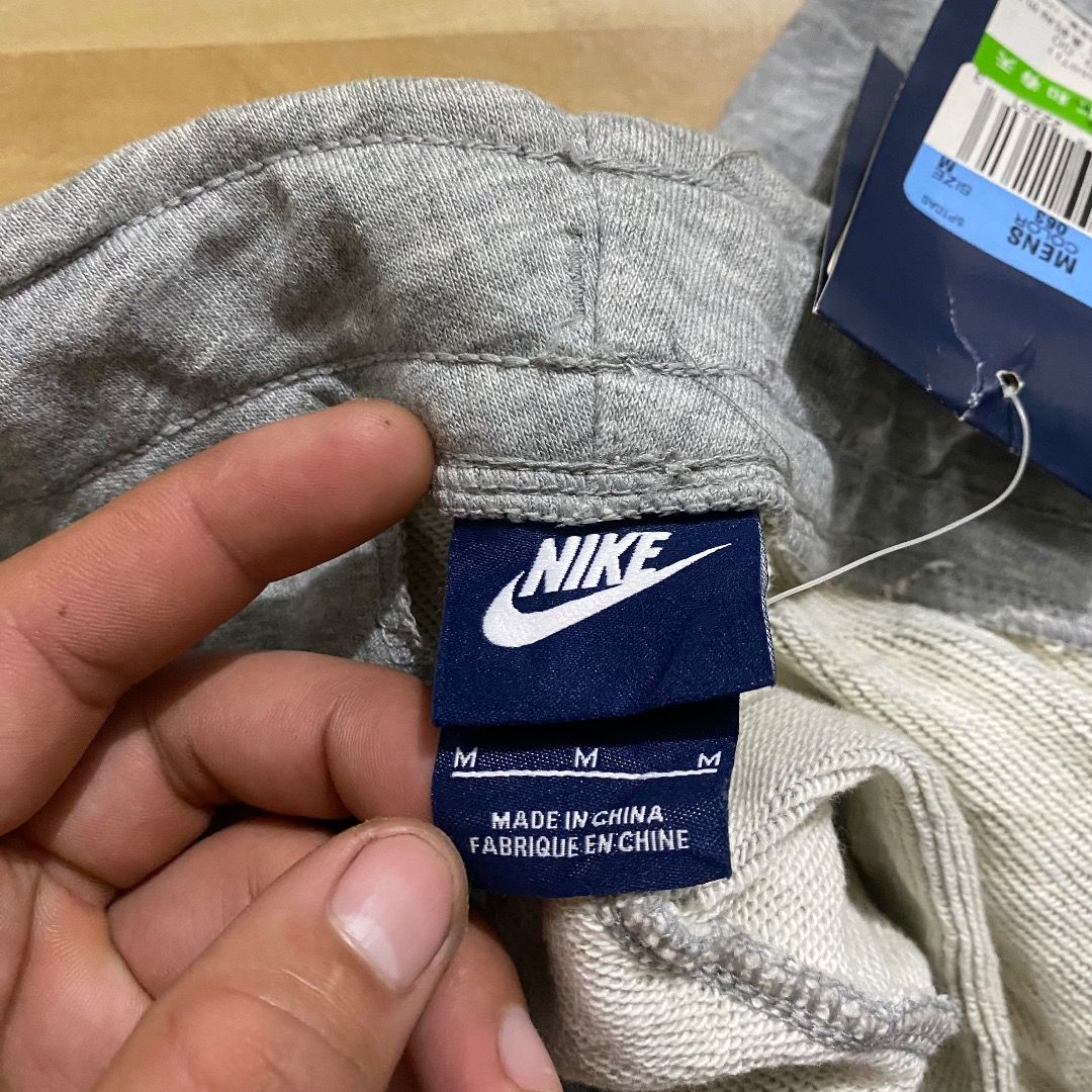 Nike Grey Sweatpants Size M (Category: Joggers) located in Bacolod City. Submitted by jeybe112019 (Listing ID 1471271967, Image 3). Description: - Brand: Nike - Condition: Brand new with tags - Color: Grey - Size: Medium (fits waist 30-31 inches) - Material: Soft and comfortable cotton blend - Design: Embroidered logo on the left leg, adjustable drawstring waistband - Fit: Standard casual fit - Origin: Made in China - Ideal for: Everyday wear, lo