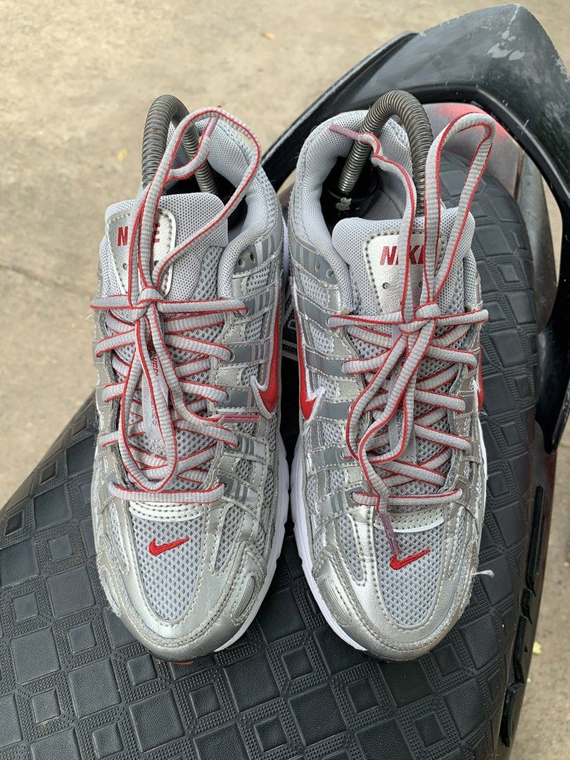 Nike P-6000 Silver Red Sneakers (Category: Community) located in Cagayan de Oro. Submitted by jename15 (Listing ID 1471138778, Image 3). Description: - Brand: Nike - Model: P-6000 - Colorway: Metallic Silver with Red Swoosh accents, white midsoles, and black outsoles - Materials: Grey mesh upper with structured silver overlays and red/grey striped laces - Condition: Clean soles and uppers - Style: Comfortable retro runner, perfect for daily wear 