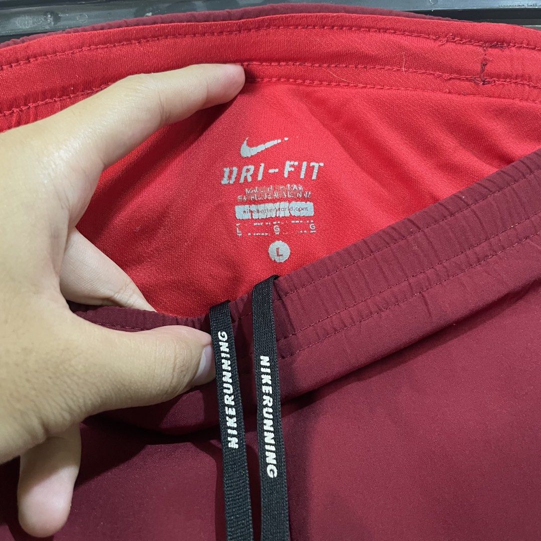 Nike Running Short (Category: Shorts) located in Taguig. Submitted by thriftstar2 (Listing ID 1471277052, Image 3). Description: W 18.5 L 15 Color rate 9/10 Size Large on tag Issue : natalsikan ng pintura and wala na yung reflector nike niya.