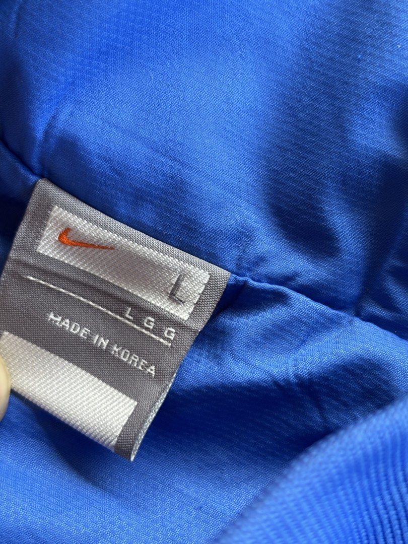 Nike side swoosh embroided logo windbreaker (Category: Activewear) located in Davao. Submitted by hippiehappy420 (Listing ID 1471273371, Image 2). Description: Nike side logo windbreaker Large Very good condition Washed and sanitized ship nationwide Negotiable price Visit my listings for more affordable clothings! Shirt Pants Shorts Caps Bags Jogger Blouse Jeans Hoodies Accessories Etc..