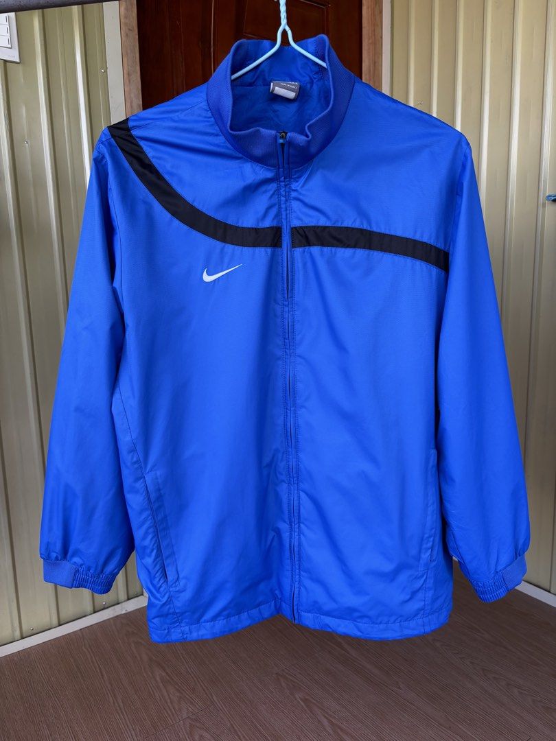 Nike side swoosh embroided logo windbreaker (Category: Activewear) located in Davao. Submitted by hippiehappy420 (Listing ID 1471273371, Image 1). Description: Nike side logo windbreaker Large Very good condition Washed and sanitized ship nationwide Negotiable price Visit my listings for more affordable clothings! Shirt Pants Shorts Caps Bags Jogger Blouse Jeans Hoodies Accessories Etc..