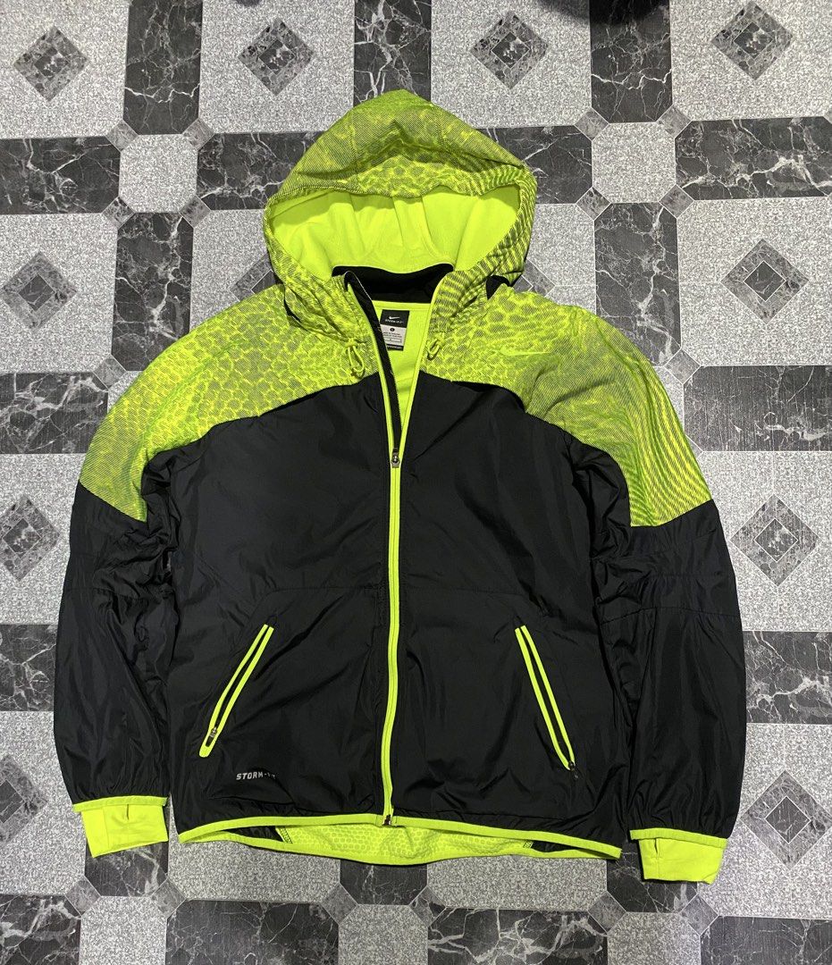Nike Storm-Fit Full Zip Jacket (Category: Coats, Jackets and Outerwear) located in Baguio. Submitted by flynes (Listing ID 1471262843, Image 1). Description: - Brand: Nike Storm-FIT x Kobe Bryant - Color: Black with neon yellow accents - Size: Large (L-27”, w-22”, sleeves-23”) - Material: 100% Polyester (Made in Thailand) - Features: Full zip closure, secure zipped pockets, iconic Kobe logo on upper back - Condition: Like new.