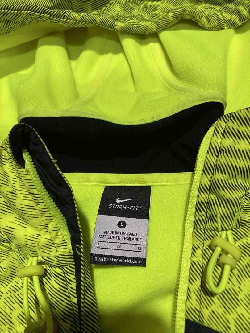 Nike Storm-Fit Full Zip Jacket (Category: Coats, Jackets and Outerwear) located in Baguio. Submitted by flynes (Listing ID 1471262843, Image 3). Description: - Brand: Nike Storm-FIT x Kobe Bryant - Color: Black with neon yellow accents - Size: Large (L-27”, w-22”, sleeves-23”) - Material: 100% Polyester (Made in Thailand) - Features: Full zip closure, secure zipped pockets, iconic Kobe logo on upper back - Condition: Like new.