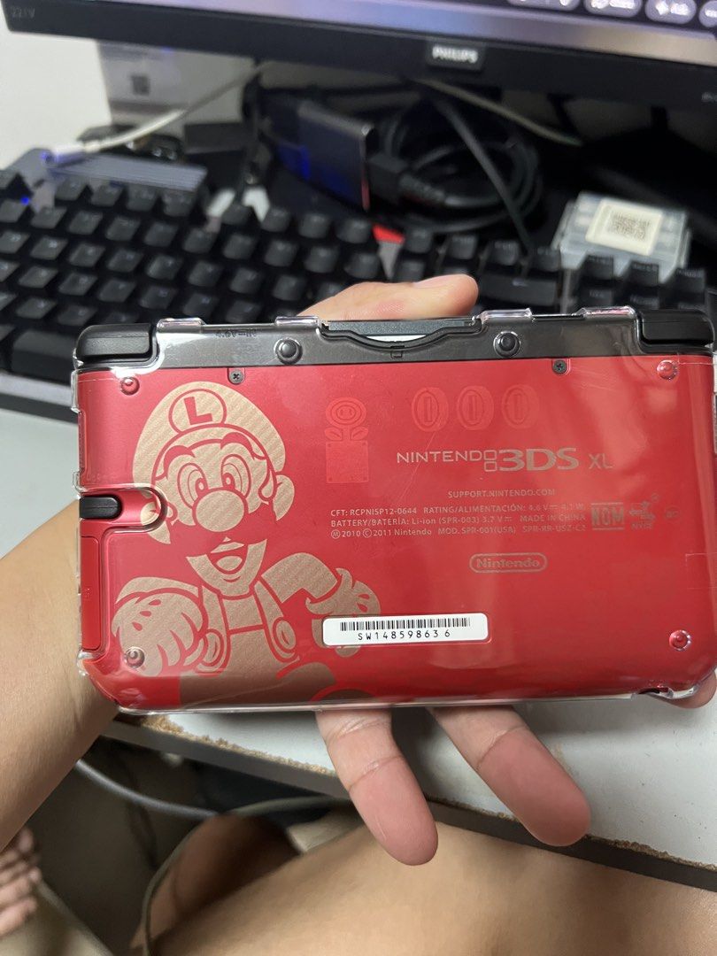 Nintendo 3DS XL Mario Limited Edition (Category: Nintendo) located in Makati City. Submitted by christian.19 (Listing ID 1471284265, Image 2). Description: - Limited Mario and Luigi graphics on the outer casing - Fully working dual screens, buttons, circle pad, and d-pad - Plays physical game cartridges (Deep Labyrinth shown for testing) - Battery holds a strong charge - Includes a clear protective hard case already installed - Clean overall cond