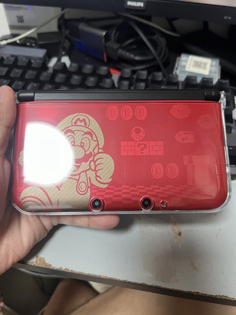 Nintendo 3DS XL Mario Limited Edition (Category: Nintendo) located in Makati City. Submitted by christian.19 (Listing ID 1471284265, Image 1). Description: - Limited Mario and Luigi graphics on the outer casing - Fully working dual screens, buttons, circle pad, and d-pad - Plays physical game cartridges (Deep Labyrinth shown for testing) - Battery holds a strong charge - Includes a clear protective hard case already installed - Clean overall cond