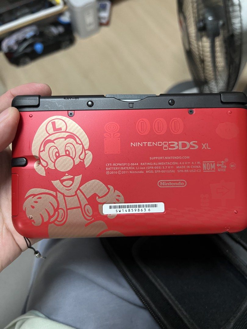 Nintendo 3DS XL Mario Limited Edition (Category: Nintendo) located in Makati City. Submitted by christian.19 (Listing ID 1471284265, Image 3). Description: - Limited Mario and Luigi graphics on the outer casing - Fully working dual screens, buttons, circle pad, and d-pad - Plays physical game cartridges (Deep Labyrinth shown for testing) - Battery holds a strong charge - Includes a clear protective hard case already installed - Clean overall cond
