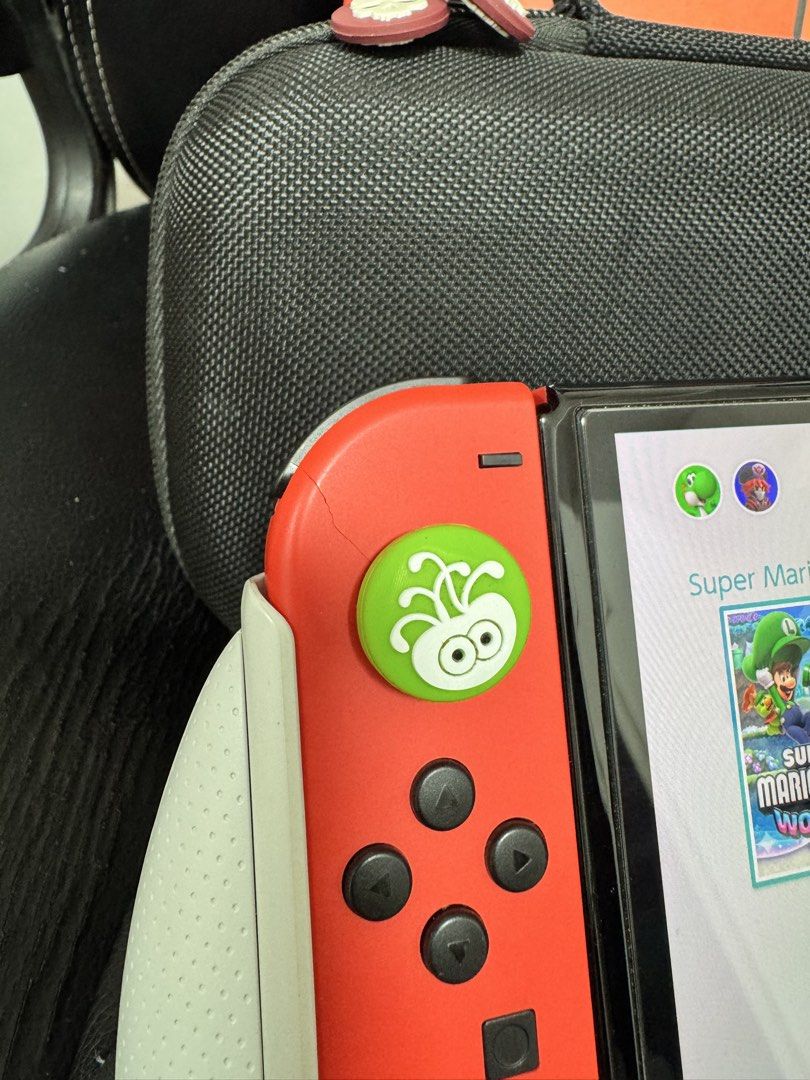 Nintendo Switch (Category: Nintendo) located in Navotas City. Submitted by emembravocastillo (Listing ID 1471170185, Image 3). Description: FOR SALE ONLY PO. (NINTENDO SWITCH OLED MARIO RED EDITION JB 256 GB WITH MANY GAMES) 13,000 fixed price last price na din po yan. Complete accessories DOCK, GRIP, HDMI CABLE, STRAPS, ORIGINAL CHARGER, BOX, TEMPERED GLASS. FREEBIES: EXTRA GRIP, ANALOG CAPS, SKULL&CO. POUCH CASE, EXTRA HAND GRIP. May slight iss