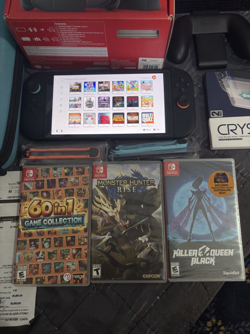 Nintendo Switch 2 with 4 Physical & 125 Digital Games (Category: Nintendo) located in Cavite. Submitted by xsavier88 (Listing ID 1471144275, Image 2). Description: 🌟Nintendo Switch 2 with Games Open for trade sa Nintendo Switch OLED/V2/V1/LIte or PS4/PS5 add ka cash. 29,500 PHP 29,500 PHP 29,500 PHP 🌟INCLUSIONS: Complete Accessories with Box Large Carrying Pouch Extra Screen Protector Receipt for warranty 4 Physical Games: 60 in 1 Game Collecti