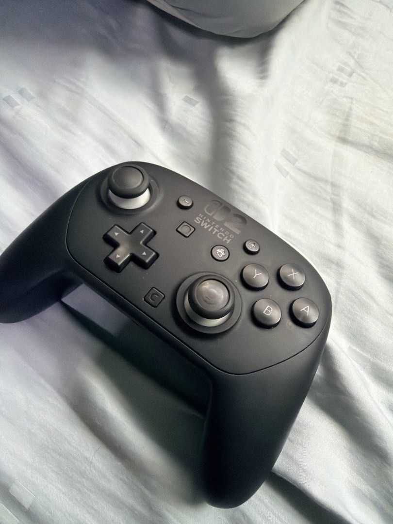 Nintendo Switch Pro Controller (Category: Controllers) located in Singapore. Submitted by geylangcollectibles (Listing ID 1471190056, Image 1). Description: Local set Everything is working Can test on your switch 2 upon meet up 9/10 condition.