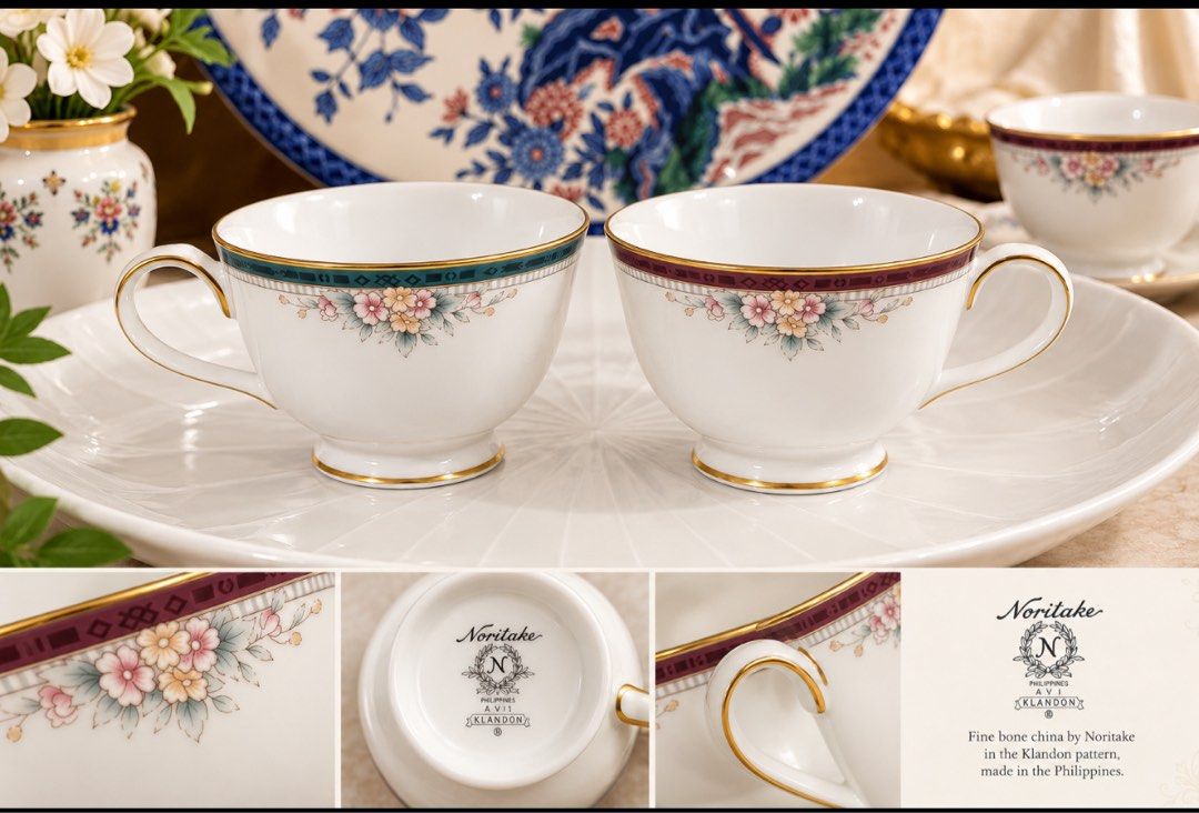 Noritake Klandon Fine Bone China Teacups (Category: Coffee & Tea Tableware) located in Masinloc. Submitted by kristineba02273 (Listing ID 1471157839, Image 1). Description: - Brand/Pattern: Noritake Klandon - Material: Fine bone china / white porcelain - Origin: Made in the Philippines - Quantity: Set of 2 teacups (one with a teal border, one with a burgundy band) - Design: Delicate pastel floral clusters and elegant gold trim on rims and footed 