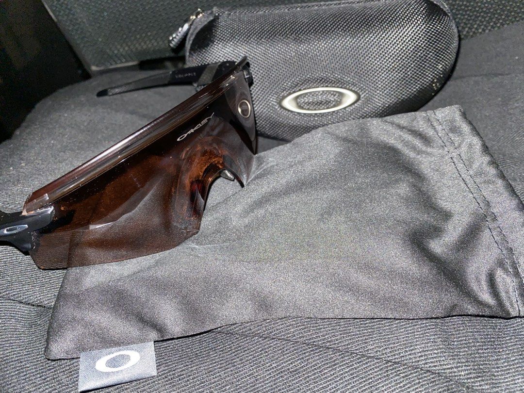 Oakley encoder brown from italy (Category: Sunglasses & Eyewear) located in Batangas. Submitted by zioniriesales (Listing ID 1471231941, Image 1). Description: - Authentic Oakley sports sunglasses in black frames with brown tinted shield lenses - Wrap-around design provides maximum peripheral vision - Pristine condition: frames and lenses are clean with no scratches spotted - Includes original black zippered hard case - Comes with original microf