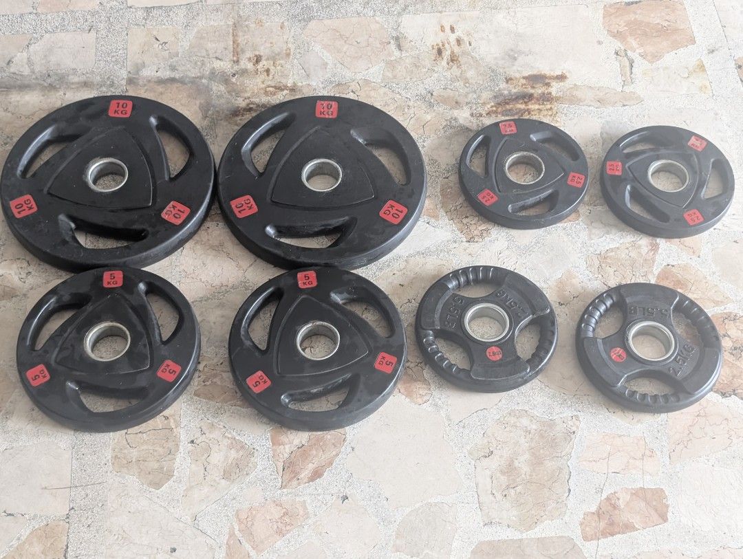 Olympic Size Weight Plates Tri Grip (Category: Weights & Dumbbells) located in Marikina City. Submitted by mrtncdrc (Listing ID 1471176692, Image 1). Description: Sold per pair. Prices below 2.5kg pair - 200 5kg pair - 700 10kg pair - 1700.