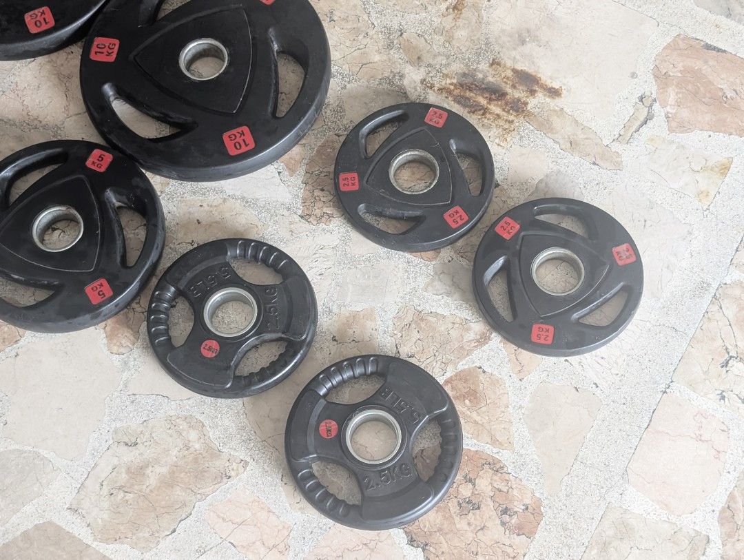 Olympic Size Weight Plates Tri Grip (Category: Weights & Dumbbells) located in Marikina City. Submitted by mrtncdrc (Listing ID 1471176692, Image 3). Description: Sold per pair. Prices below 2.5kg pair - 200 5kg pair - 700 10kg pair - 1700.