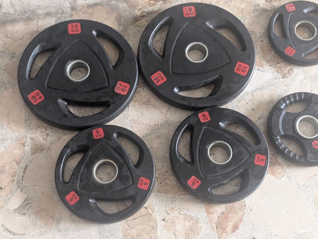 Olympic Size Weight Plates Tri Grip (Category: Weights & Dumbbells) located in Marikina City. Submitted by mrtncdrc (Listing ID 1471176692, Image 2). Description: Sold per pair. Prices below 2.5kg pair - 200 5kg pair - 700 10kg pair - 1700.