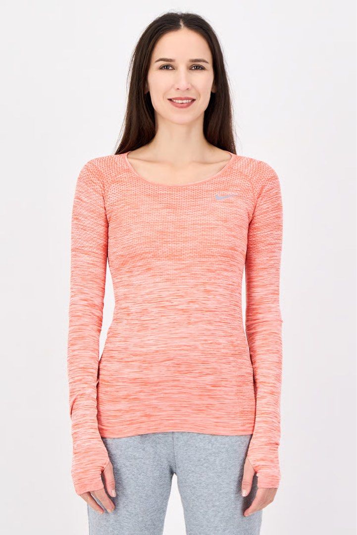 Orange Nike Drifit Long-sleeve (Category: Activewear) located in Davao. Submitted by sb.thriftwear (Listing ID 1471147498, Image 1). Description: Size: Small Dimensions: W- 15” L- 24” Issue: None. Good as new Color may vary due to lighting. ⚠️All items are thrifted. Please manage your expectations..
