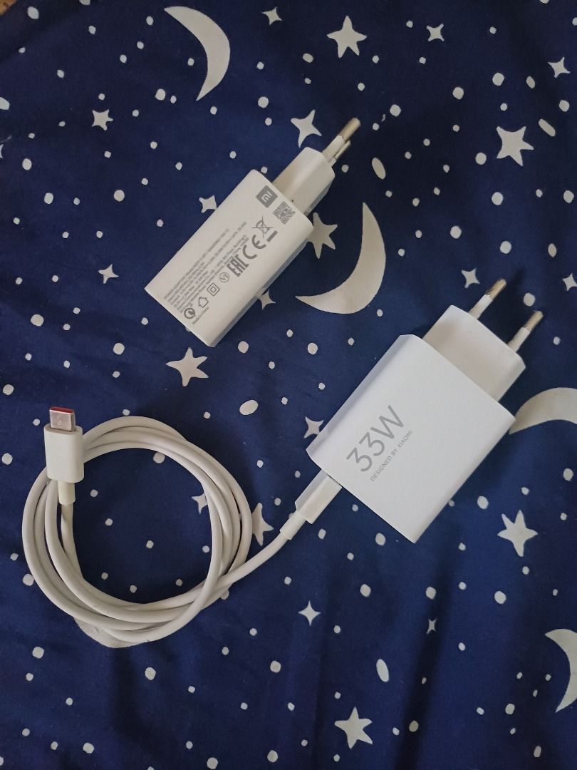 Original Redmi charger Type C 33W (2pcs) (Category: Chargers & Cables) located in Cebu City. Submitted by Brixx (Listing ID 1471192019, Image 1). Description: - Authentic 33W Redmi / Xiaomi fast charging adapter - Includes original Type-C charging cable - Sleek white minimalist design - High-speed charging performance for compatible phones - Durable build quality and safe power output.