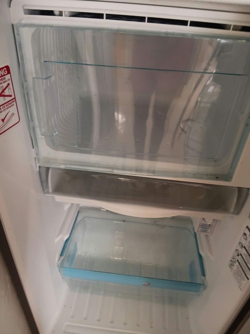 Panasonic One Door Refrigerator NR-AQ151NS (Category: Refrigerators and Freezers) located in Manila. Submitted by almira17 (Listing ID 1471270436, Image 3). Description: - Model: Panasonic NR-AQ151NS Single Door Fridge - Color: Sleek Silver Finish - Energy Rating: 312 - Interior Layout: Top freezer compartment, middle shelf, and bottom vegetable crisper - Door Storage: Three door bins complete with an egg tray - Controls: Easy-to-use temperature 