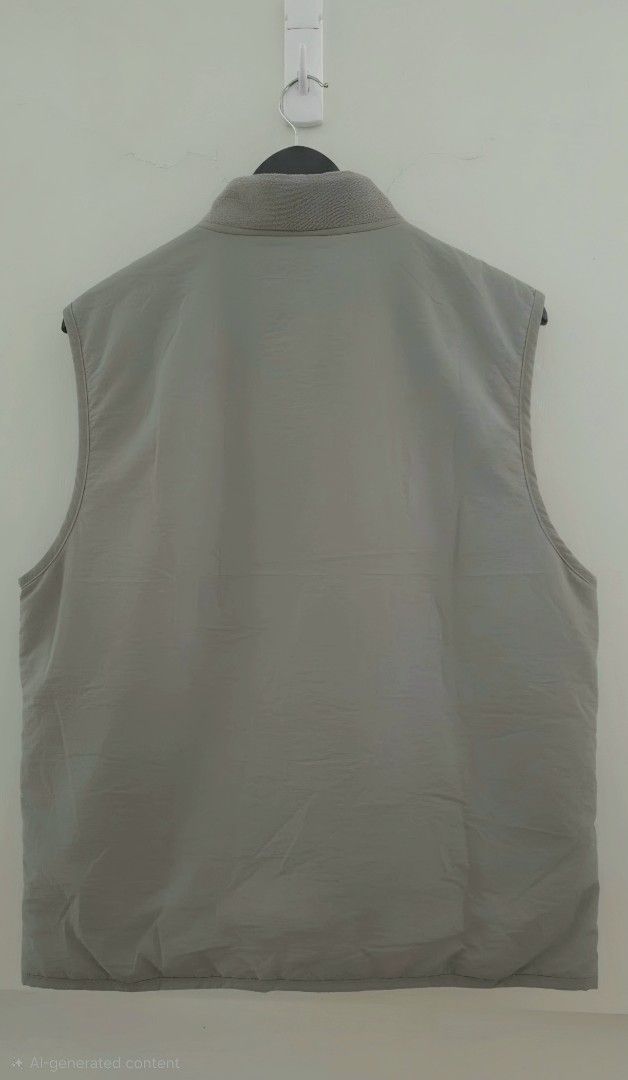 Patagonia Men's Grey Snap-Front Vest Size M (Category: Vests) located in Quezon City. Submitted by curatedbymissgee (Listing ID 1471169664, Image 2). Description: 🩶 **Patagonia Grey Vest | Size M – Lightweight, Versatile & Effortlessly Cool!** **Sleeves are overrated anyway!** 😎✨ Who says you need a full jacket to make a style statement? This Patagonia grey vest is the perfect layering companion for cooler days, travel adventures, and those tri