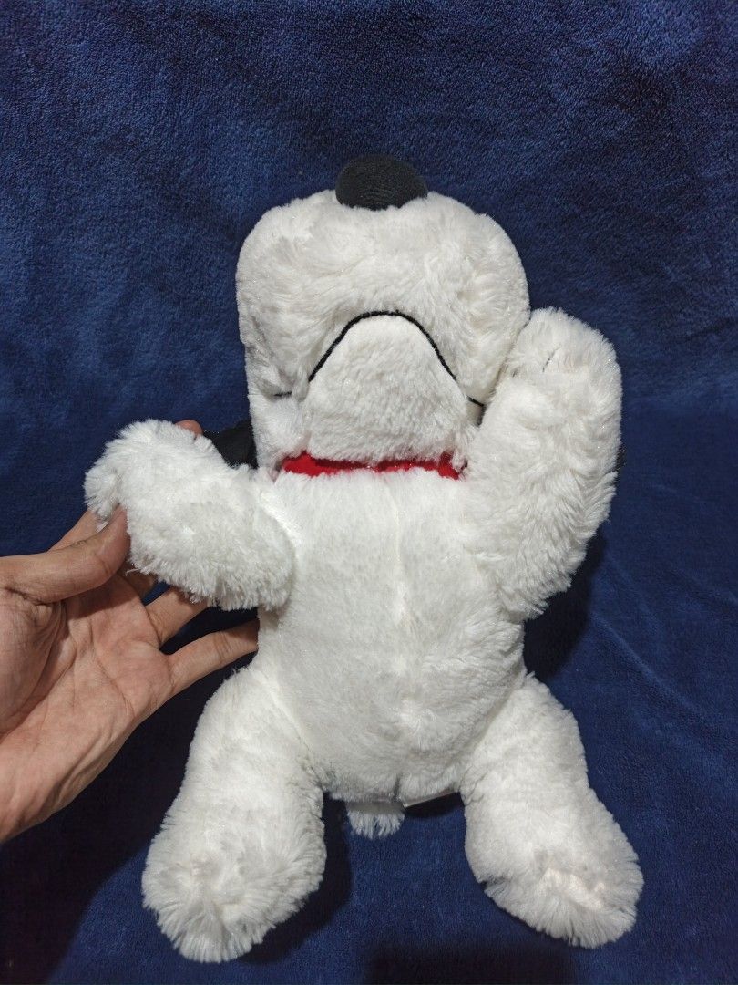 Peanuts Snoopy Plush Toy Stuffed Animal (Category: Plushies & Soft Toys) located in Manila. Submitted by kirstentoyshub (Listing ID 1471251756, Image 2). Description: - Official 2019 Peanuts Worldwide LLC tag attached - Features classic white and black fur with a cute red collar - Super soft and huggable texture - Pristine, clean condition with no stains or damage - Perfect gift for Snoopy fans or addition to any collection.