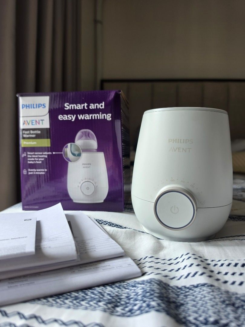 Philips Avent Fast Bottle Warmer Premium (Category: Breastfeeding & Bottle Feeding) located in Pasig City. Submitted by prelovedby.zp (Listing ID 1471180855, Image 1). Description: Bought in May 2025 Complete with box and manual Label slightly faded but no issues when being used SRP of brand new at Php 4,699 RFS: graduated from warming/defrosting milk stash; food heated through microwave MOP: Gcash Location: Pasig.