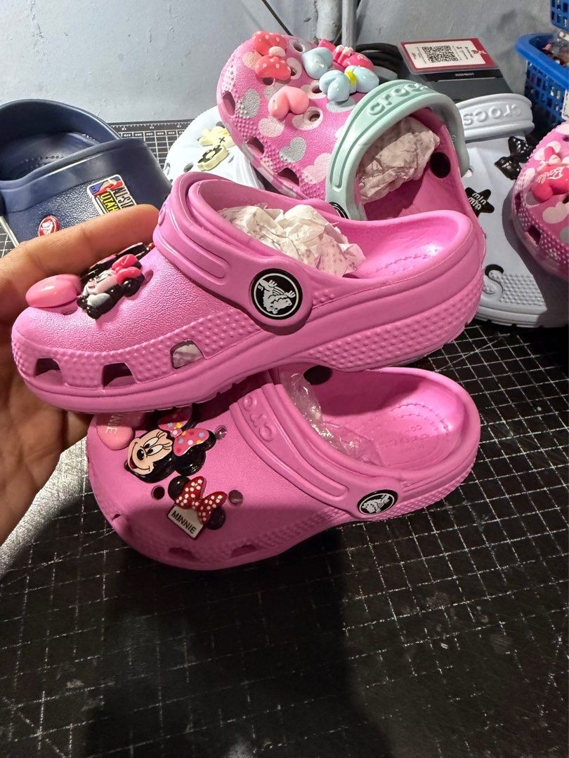 Pink Minnie Mouse Kids Crocs Size C8 (Category: Babies & Kids Fashion) located in Meycauayan. Submitted by twinblessing (Listing ID 1471177679, Image 2). Description: - Pink kids Crocs (Size C8) - Comes with Minnie Mouse Jibbitz charms - Slip-on clog style with heel straps - Bright pink color - Clean and ready to wear.