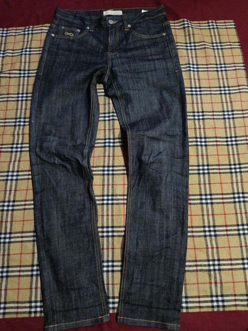 PLAC Dark Wash Denim Jeans Size 31 (Category: Jeans) located in General Santos City (Dadiangas). Submitted by freehorse.5f2a61 (Listing ID 1471226736, Image 1). Description: - Brand: PLAC - Style: Dark wash straight leg denim jeans - Size: 31 (indicated on inner tag) - Material: Comfortable cotton, polyester, and polyurethane blend - Details: Orange contrast stitching, back waistband leather patch, and branded rear pocket tag - Condition: Excelle