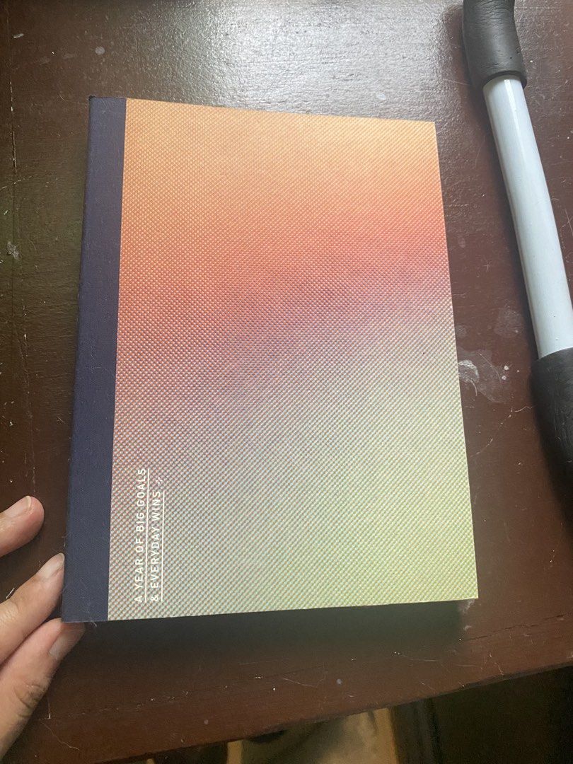 Planner from Everyday explorers.co (Category: Stationery & School Supplies) located in Makati City. Submitted by declutter_saleeeee (Listing ID 1471195945, Image 1). Description: Bought for 25USD - selling for 1k - Vibrant colorful gradient cover in orange, yellow, and blue shades - 100% unused pages, ready for writing - Includes dedicated sections for gratitude and yearly intentions - Features structured monthly plans and weekly views - Perfect 