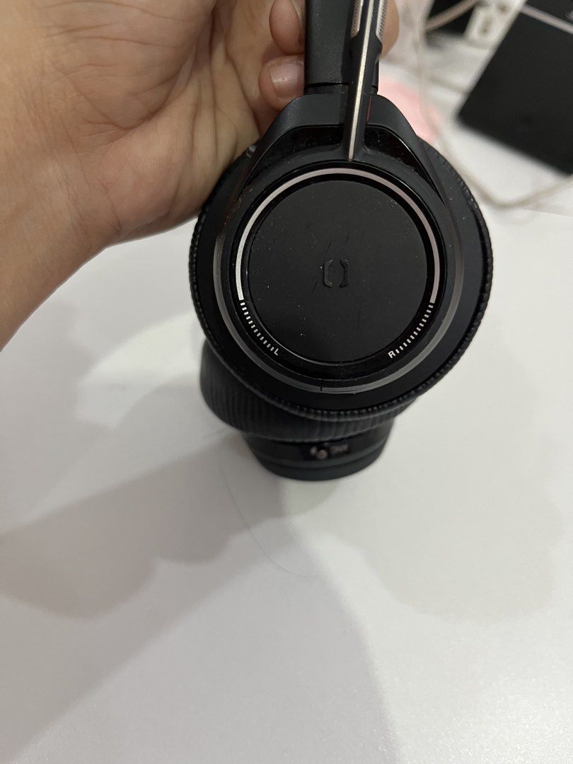 Plantronics Wireless On-Ear Headset with Mic (Category: Headphones & Headsets) located in Rizal. Submitted by oncelove143 (Listing ID 1471140953, Image 2). Description: - Brand: Plantronics - Style: Over-ear headphones in black with stylish silver headband accents and red ear cup interior mesh - Comfort: Highly cushioned ear pads and padded headband for all-day wear - Audio & Mic: Built-in boom microphone arm on the left side for clear office cal