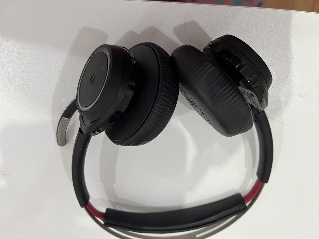 Plantronics Wireless On-Ear Headset with Mic (Category: Headphones & Headsets) located in Rizal. Submitted by oncelove143 (Listing ID 1471140953, Image 1). Description: - Brand: Plantronics - Style: Over-ear headphones in black with stylish silver headband accents and red ear cup interior mesh - Comfort: Highly cushioned ear pads and padded headband for all-day wear - Audio & Mic: Built-in boom microphone arm on the left side for clear office cal