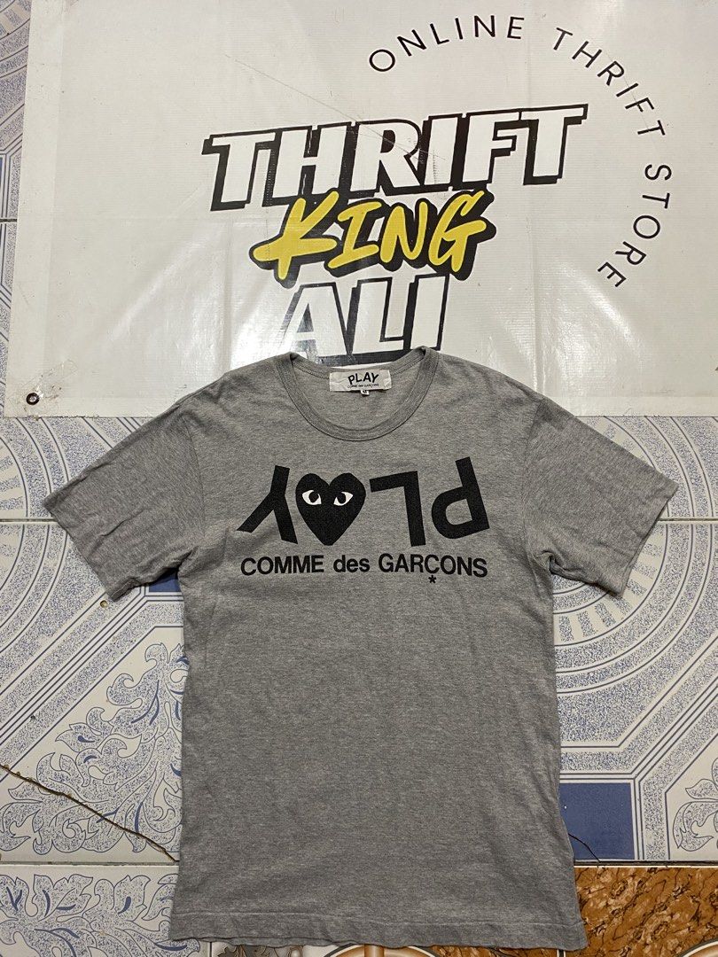 Play Comme Des Garcons Tee (Category: Tshirts & Polo Shirts ) located in Rosario. Submitted by thrift_king_ali (Listing ID 1471223506, Image 1). Description: PLAY Medium Dimes: W-19 L-28 issue: minimal hairlines sa eyes excellent condition 500+sf.