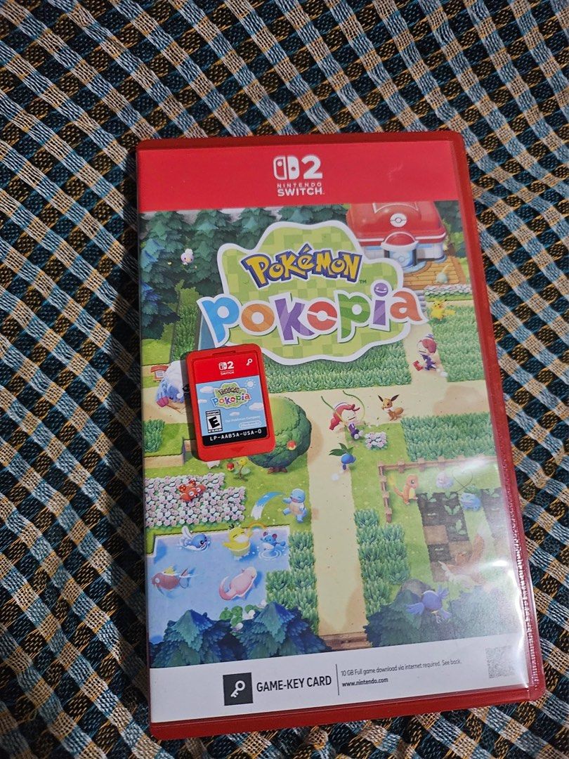 Pokemon Pokopia Nintendo Switch 2 Game-Key Card (Category: Nintendo) located in Quezon City. Submitted by seulrenes (Listing ID 1471258421, Image 1). Description: - Game: Pokemon Pokopia for Nintendo Switch 2 - Format: Game-key card (internet download required for full game) - Region: USA - Includes: Red game case, matching red cartridge, and full artwork insert - Condition: Clean case, great addition to any collection.