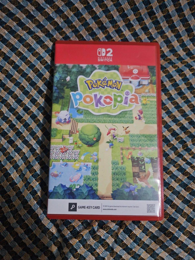 Pokemon Pokopia Nintendo Switch 2 Game-Key Card (Category: Nintendo) located in Quezon City. Submitted by seulrenes (Listing ID 1471258421, Image 2). Description: - Game: Pokemon Pokopia for Nintendo Switch 2 - Format: Game-key card (internet download required for full game) - Region: USA - Includes: Red game case, matching red cartridge, and full artwork insert - Condition: Clean case, great addition to any collection.