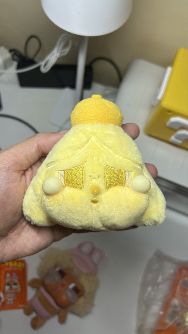 POP MART CRYBABY TEARS LAUNCH PROJECT (Category: Plushies & Soft Toys) located in Quezon City. Submitted by ptrickgo (Listing ID 1471138566, Image 1). Description: - Authentic Pop Mart Crybaby yellow plush keychain - Triangle-shaped stuffed toy with cute embroidered face and round cheeks - Fluffy, soft texture in a bright yellow color - Equipped with a yellow plastic ring loop and branding text on the back - Original product tag attached at the b
