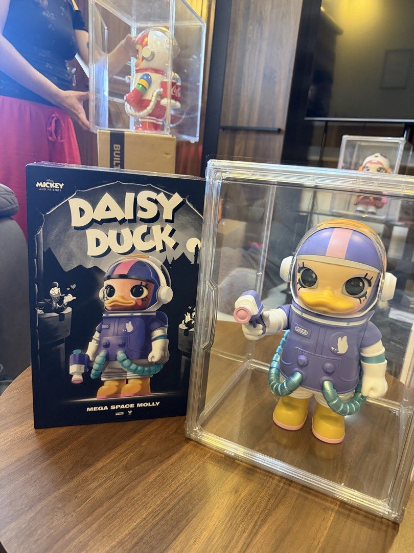 POP MART MEGA SPACE MOLLY 400% Disney Daisy Duck (Category: Designer & Blind Box Toys) located in Cavite. Submitted by trueluxury_boutique (Listing ID 1471162790, Image 1). Description: POP MART MEGA SPACE MOLLY 400% Disney Daisy Duck | With Box & Acrylic Display Case Price: ₱12,500 (Negotiable) Selling my POP MART MEGA SPACE MOLLY 400% Disney Daisy Duck collectible figure from the Disney Mickey & Friends collection. Condition: * Like new — displ