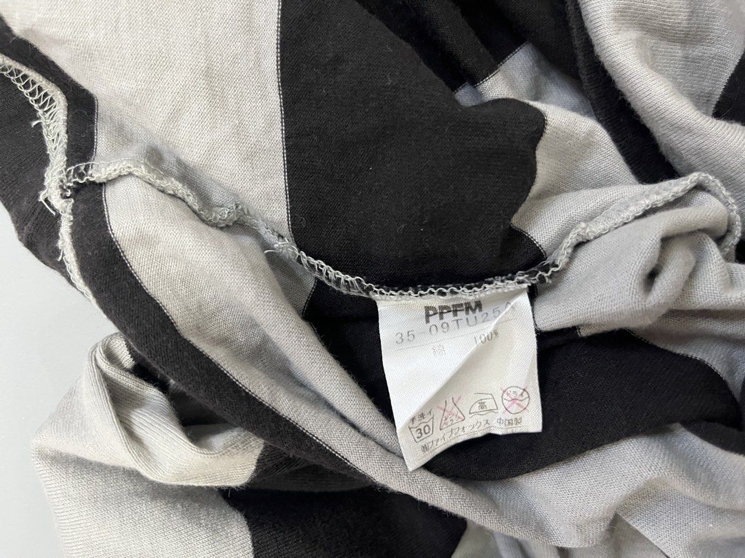 PPFM Black Grey Striped Long Sleeve Medium (Category: Tshirts & Polo Shirts ) located in Mabalacat. Submitted by aas_thriftfings (Listing ID 1471269442, Image 3). Description: - Brand: PPFM - Style: Striped long sleeve shirt, classic black and grey - Size: Medium (tagged inside) - Material: 100% cotton - Condition: Excellent with original inside wash tag and collar label intact - Vibe: Laid-back streetwear staple.