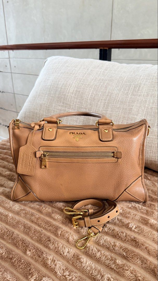 Prada Daino Leather E/W Bag (Category: Luxury Bags & Wallets) located in Rizal. Submitted by kwisee (Listing ID 1471121771, Image 1). Description: Authentic Prada leather satchel in a rich warm brown shade. Two-way bag. Photos of signs of use/flaws upon request..