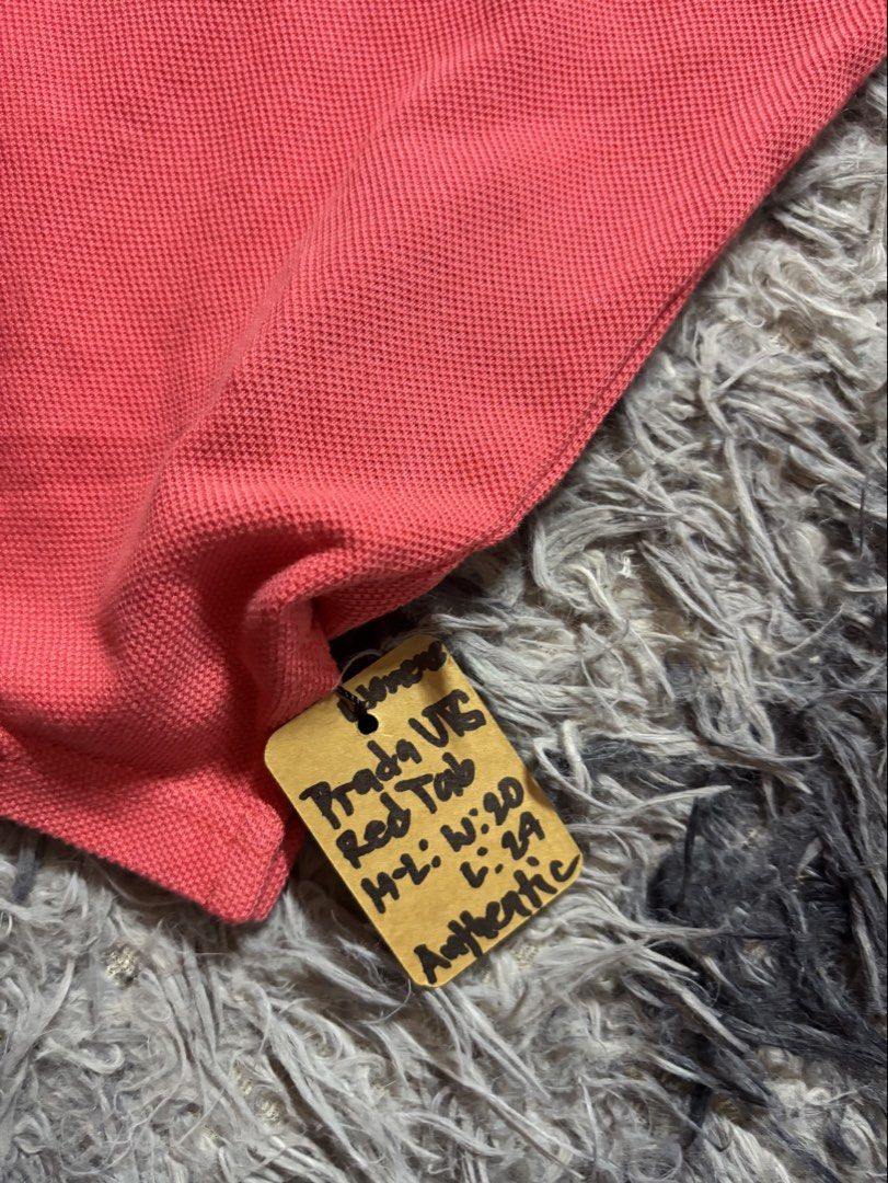 Prada Red Tab (Category: Activewear) located in Legazpi City. Submitted by thesource052 (Listing ID 1471290128, Image 3). Description: Prada Red Tab Authentic Medium womens on tag fit to large Width: 20” Length:24” Excellent condition No issue.