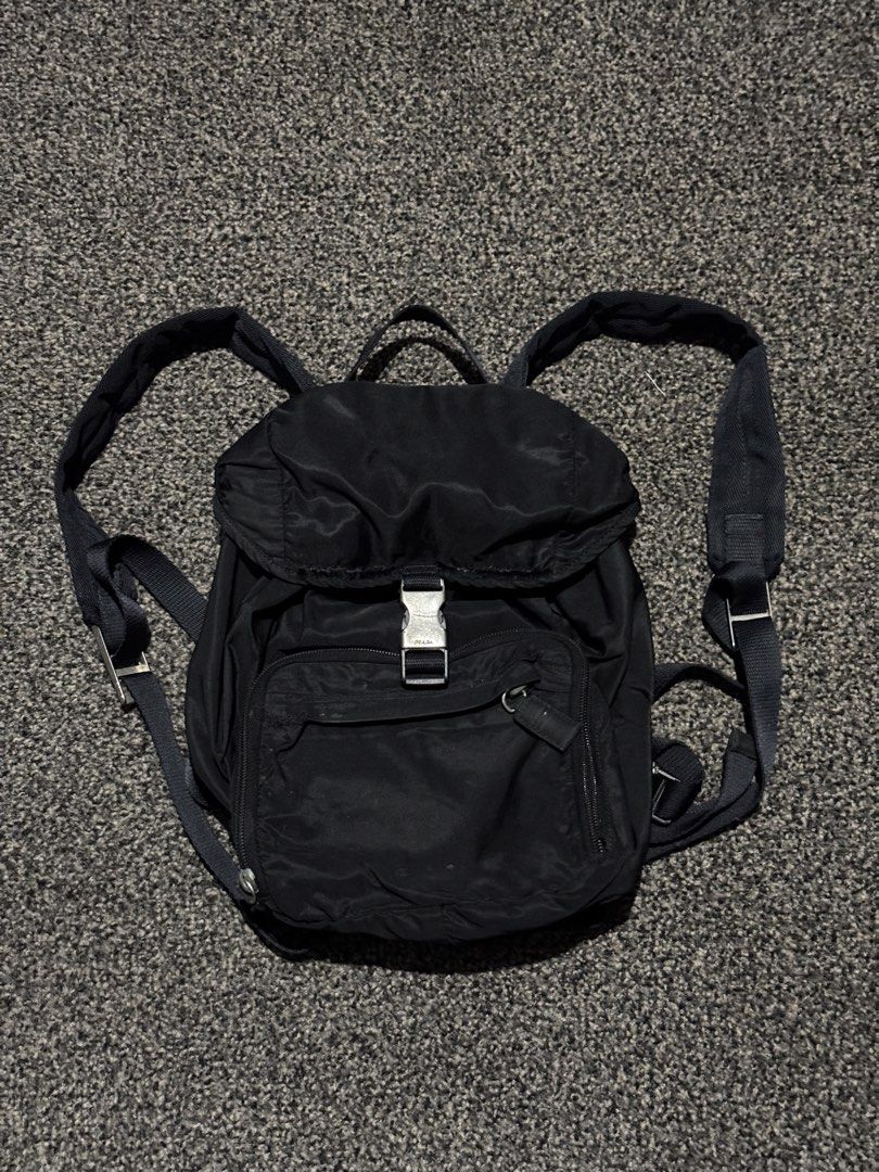 Prada Tessuto Smalto Backpack (Category: Luxury Bags & Wallets) located in Bulacan. Submitted by thriftstarph (Listing ID 1471267206, Image 1). Description: PLEASE READ THE DESCRIPTION BELOW ‼️ Prada Backpack Tessuto Smalto Color way: 7/10 issue: fading color (back hit) and stitching From: japan 1200 php📩.