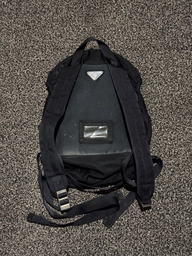 Prada Tessuto Smalto Backpack (Category: Luxury Bags & Wallets) located in Bulacan. Submitted by thriftstarph (Listing ID 1471267206, Image 3). Description: PLEASE READ THE DESCRIPTION BELOW ‼️ Prada Backpack Tessuto Smalto Color way: 7/10 issue: fading color (back hit) and stitching From: japan 1200 php📩.