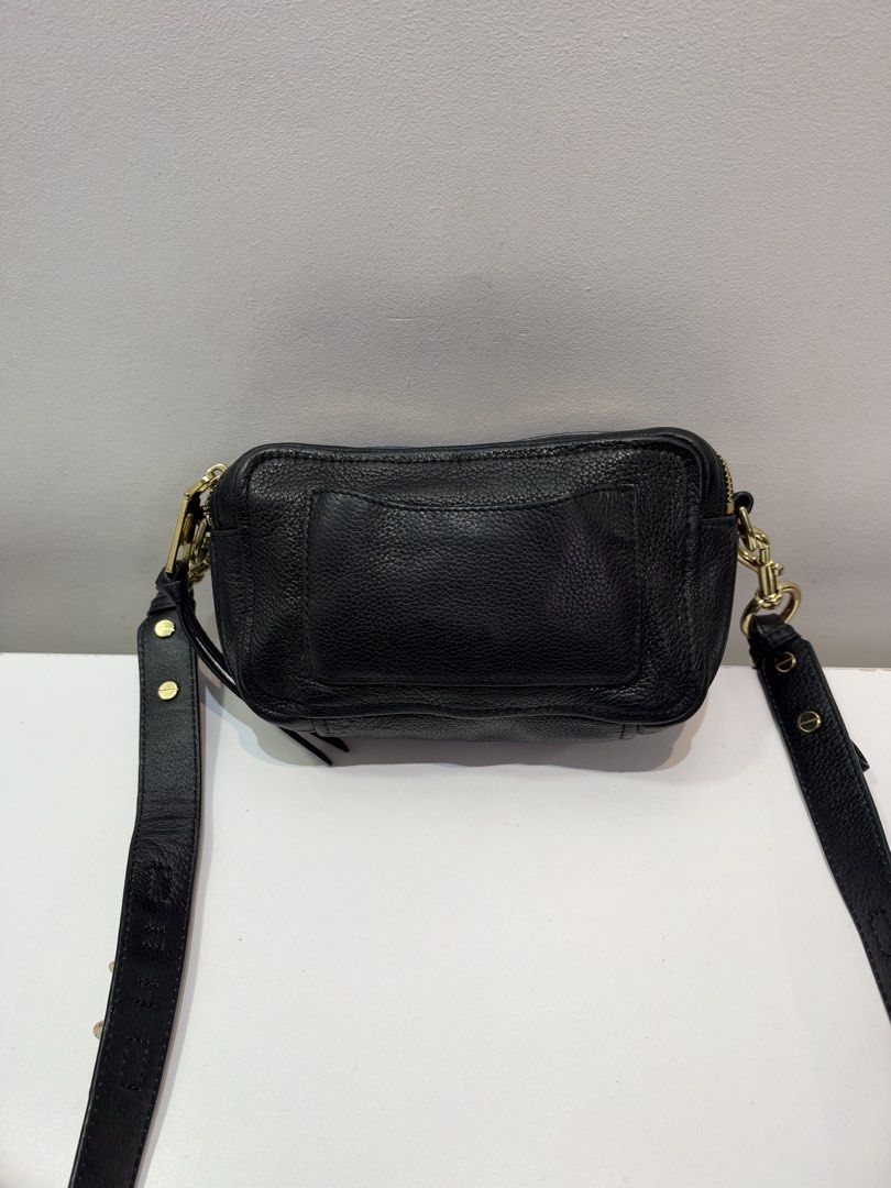 Pre-loved Marc Jacobs The Softshot 21 Camera Bag (Category: Luxury Bags & Wallets) located in Cebu City. Submitted by brandedcorner_ph (Listing ID 1471185817, Image 2). Description: Pre-loved ((M))arc ((J))acobs The Softshot 21 Camera Bag 100% Authentic or money back Condition • Excellent condition • No flaws Product Details •Color: black •Hardware: Gold tone •Material: Leather •Approximate Dimensions in inches: H4.5 x W8 x D3.5 Color may vary du