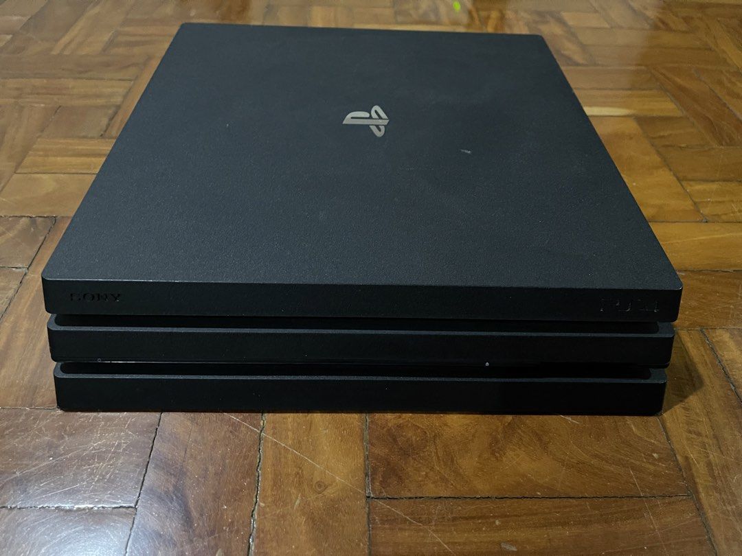 PS4 PRO WITH GAMES AND CONTROLLERS (Category: PlayStation) located in Manila. Submitted by cleverwind_9dc42e (Listing ID 1471255555, Image 3). Description: Selling this preloved PS4 PRO!! I used this gaming console back during pandemic and now I'm looking to sell this for funds and other purposes. What comes with: -Ps4 Console (1tb storage) -2 Controllers -Many games (shown in the photos) -Necessary cables needed (also shown) This price is still 