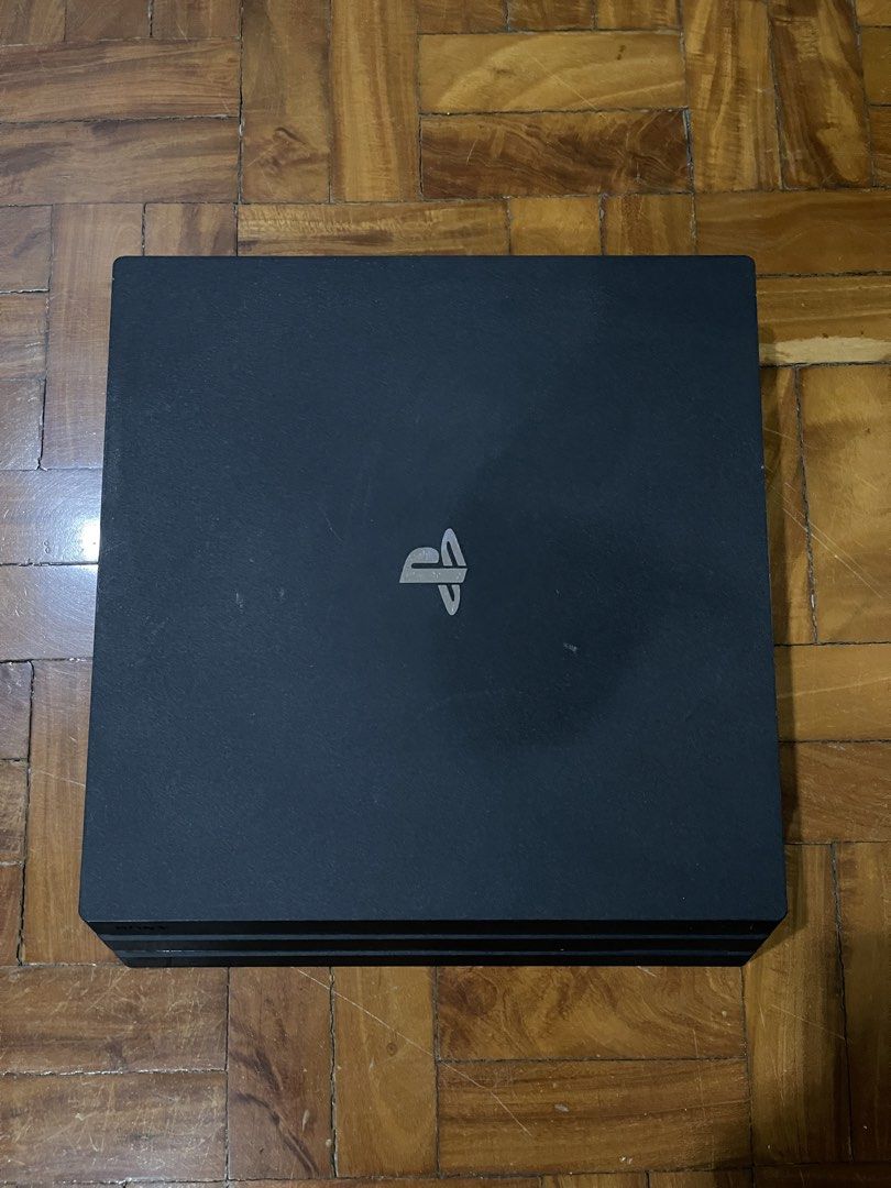 PS4 PRO WITH GAMES AND CONTROLLERS (Category: PlayStation) located in Manila. Submitted by cleverwind_9dc42e (Listing ID 1471255555, Image 2). Description: Selling this preloved PS4 PRO!! I used this gaming console back during pandemic and now I'm looking to sell this for funds and other purposes. What comes with: -Ps4 Console (1tb storage) -2 Controllers -Many games (shown in the photos) -Necessary cables needed (also shown) This price is still 
