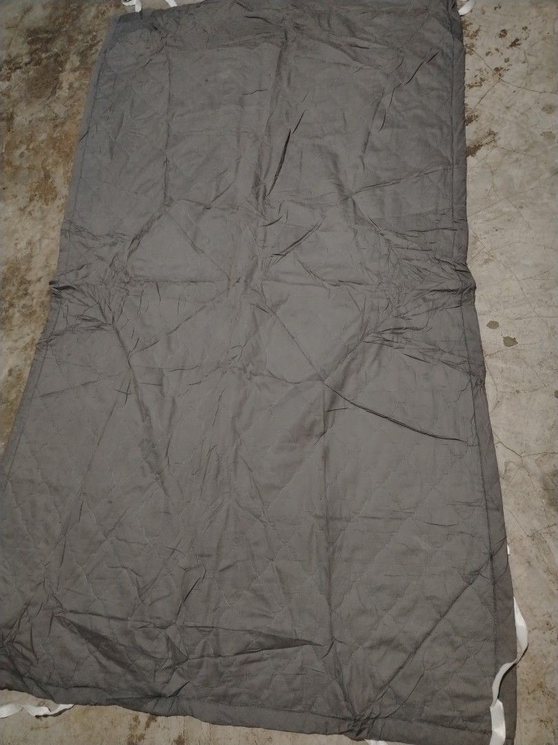 Quilted Grey Mattress Topper with Corner Elastic Straps (Category: Bed Frames & Mattresses) located in Manila. Submitted by mimachelleukay (Listing ID 1471257926, Image 1). Description: - Color: Stylish grey with patterned stitching - Material: Soft and comfortable fabric with white backing - Secure Fit: Fitted with elastic bands on all four corners - Easy Maintenance: Simple to put on, take off, and machine wash - Size: Standard rectangular shap