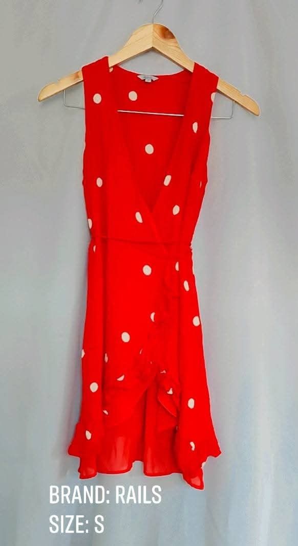 RAILS Red Polka Dot Wrap Dress Size S (Category: Dresses) located in Bacoor. Submitted by stargazer1084 (Listing ID 1471213696, Image 1). Description: - Brand: Rails - Color/Pattern: Red with white polka dots - Size: Small - Style: Sleeveless V-neck wrap dress with attached waist tie and ruffled hem - Material: Lightweight, ideal for warm weather - Condition: Excellent.