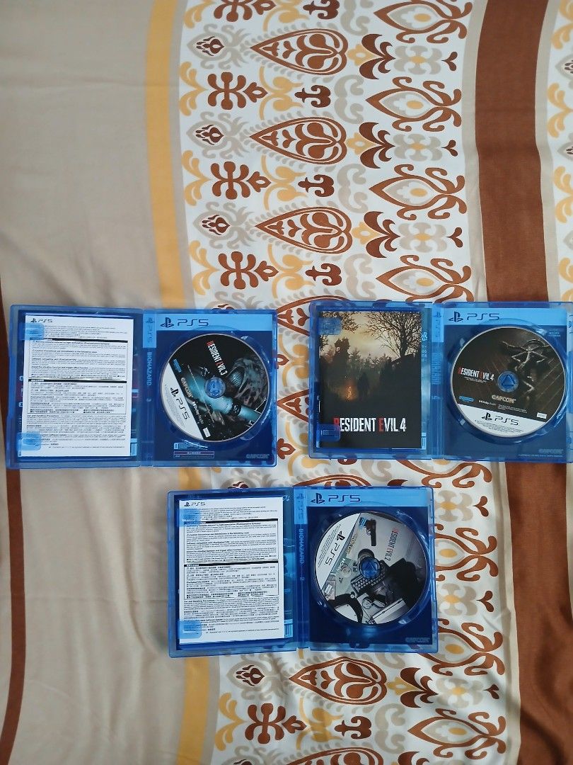 Resident Evil 2, 3, and 4 Remake for PS5 (SOLD AS A SET) (Category: PlayStation) located in Paranaque City. Submitted by juntee.pabo (Listing ID 1471152003, Image 2). Description: - Platform: PlayStation 5 (PS5) - Games included: Resident Evil 2, Resident Evil 3, and Resident Evil 4 - Condition: Great shape discs with original blue cases and cover art - Bundle deal: Play the complete modern survival horror trilogy back-to-back - Shipping: Fast sh