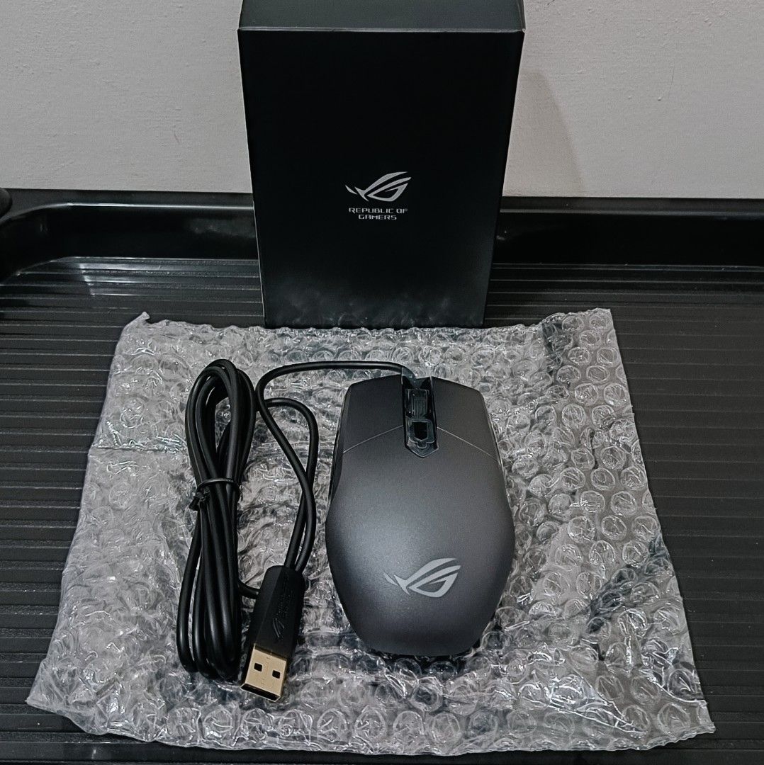 ROG Gaming mouse (Category: Mouse & Mousepads) located in Taguig. Submitted by quickwolf_e53517 (Listing ID 1471190542, Image 3). Description: DECLUTTER SALE! 📦 Selling some of my personal electronics & gadgets. All items are pre-owned. Details, prices, and actual photos will be provided. Message me if interested! 😊.