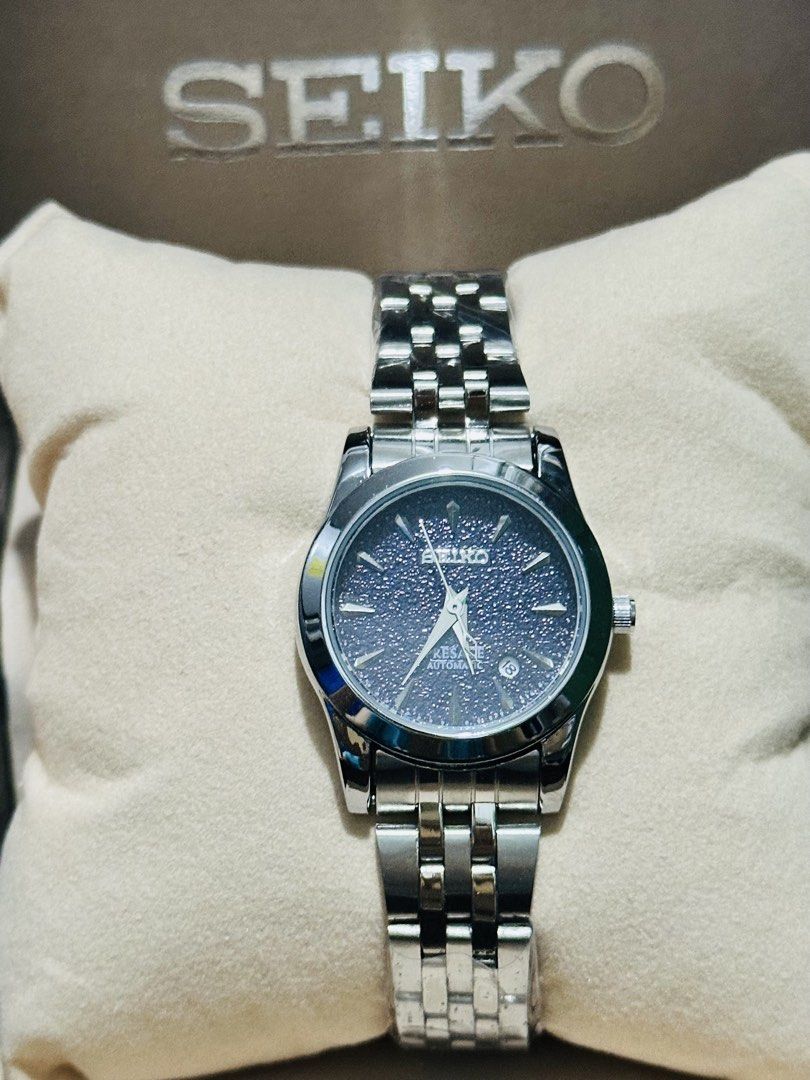 Rolex Oyster Perpetual Datejust Watch (Category: Luxury Watches) located in Manila. Submitted by mbcollections251 (Listing ID 1471237284, Image 3). Description: - Authentic Rolex Oyster Perpetual Datejust wristwatch - Luxurious two-tone stainless steel and gold bracelet with matching fluted bezel - Striking dark dial featuring premium diamond index markers - Classic day display at the top and date window at 3 o'clock with cyclops lens - Complete 