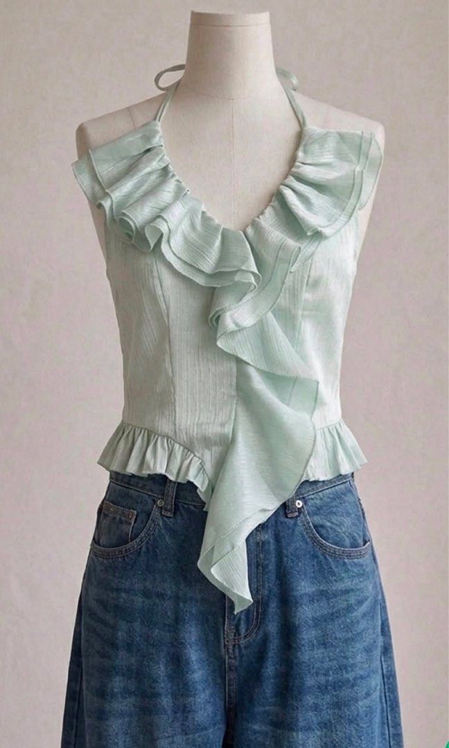 Ruffles Halter Top (Category: Sleeveless) located in Taytay. Submitted by storedbys (Listing ID 1471147825, Image 1). Description: small to medium tie up in the neck area no flaws message for when worn.
